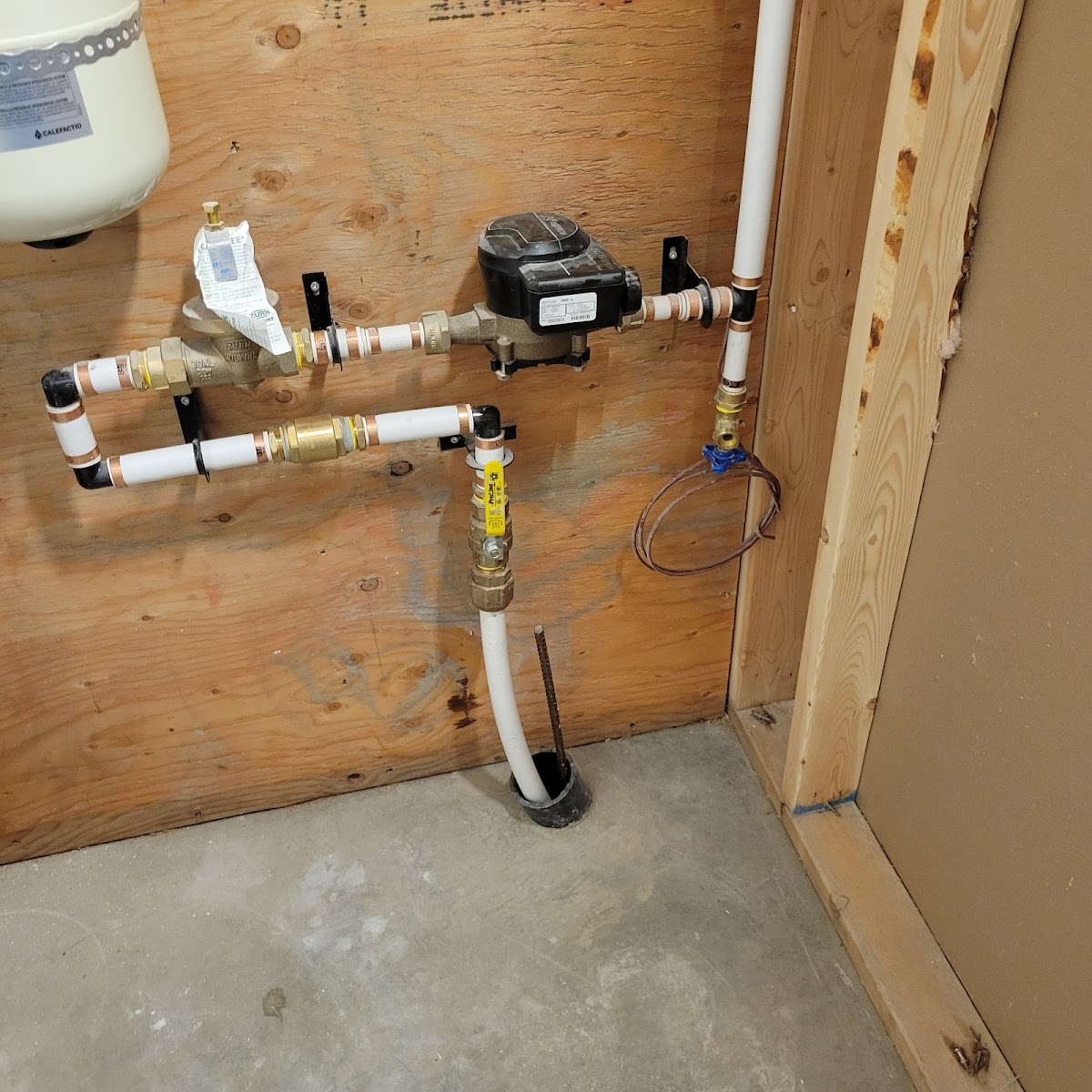 Backflow preventer and brass valve manifold, neatly piped